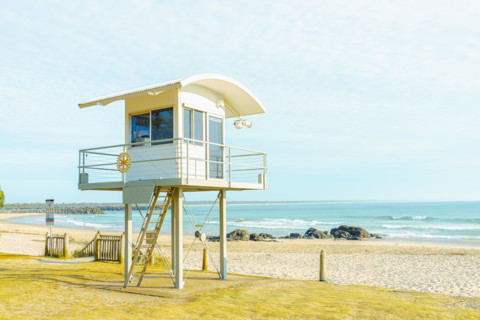 Lifeguard tower on empty beach