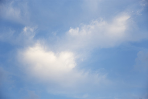 Soft white clouds against blue sky