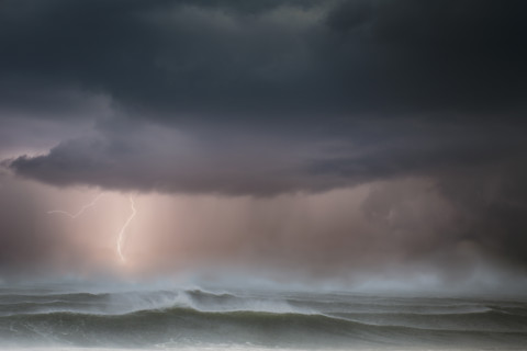 Storm at rough sea at dusk
