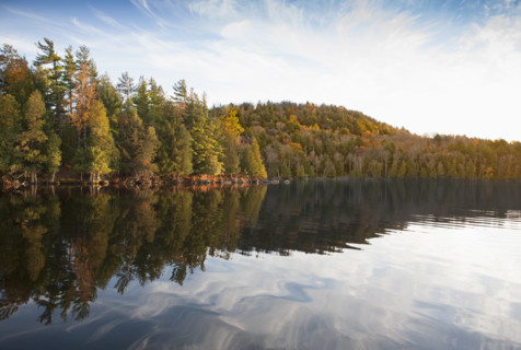Quiet cove on Upper Saranac Lake in New Yorks Adirondack Mountains