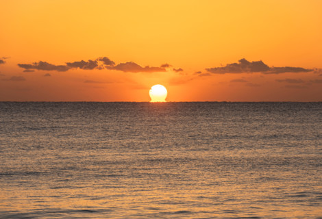 Sun rising over calm ocean. Boca Raton, Florida, United States