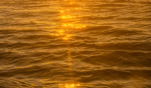 Close-up of ocean surface reflecting sunlight. Boca Raton, Florida, United States