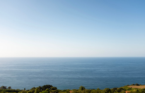 Clear sky over calm sea. San Sebastian, Gipuzkoa, Spain