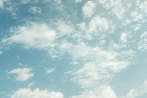 White puffy clouds against blue sky. San Sebastian, Gipuzkoa, Spain
