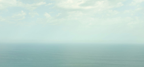 Sky above calm sea in fog. San Sebastian, Gipuzkoa, Spain