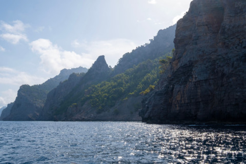 Calm sea and cliffs on sunny day. , Mallorca, Spain