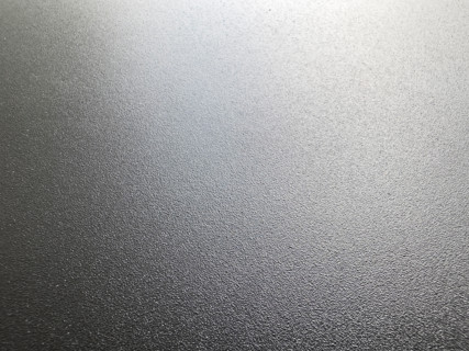 Textured black metal surface. Nashville, Tennessee, United States