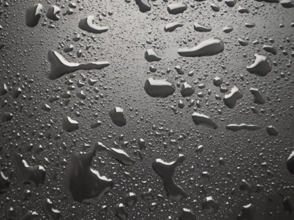 Water droplets on black metal surface. Nashville, Tennessee, United States