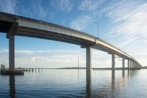 Apalachicola River Bridge crossing calm river. Apalachicola, Florida, United States