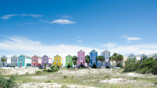 Row of colorful beach houses on sunny day. St. George Island, Florida, United States