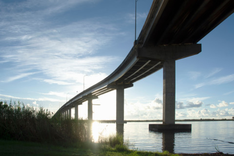 Low angle view of Apalachicola Bridge at sunrise. Apalachicola, Florida, United States