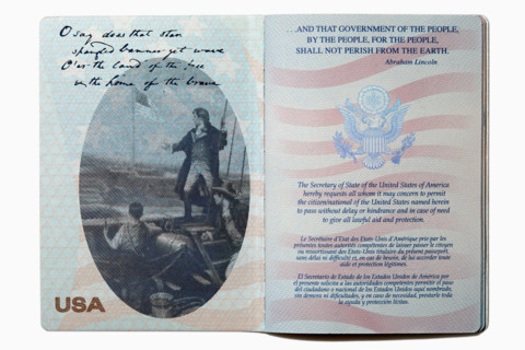 Open US passport on white background. New york City, New York State, United States