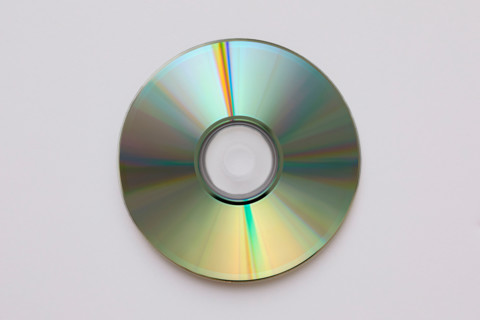 Compact disc on white background. New York City, New York State, United States