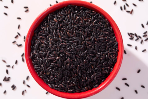 Overhead view of bowl of black rice. New York City, New York State, United States