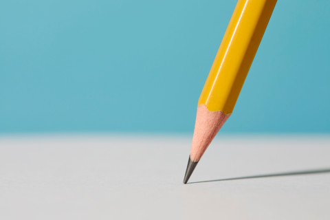 Close-up of pencil on white paper. New York City, New York State, United States