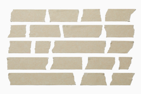 Multiple strips of tape on white background. New York City, New York State, United States
