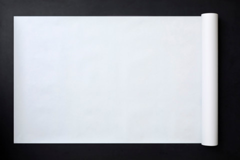 Blank banner paper on black background. New York City, New York State, United States