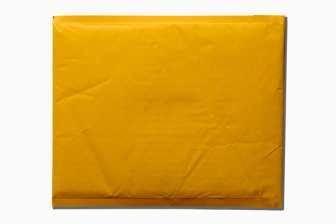 Blank bubble mailer on white background. New York City, New York State, United States