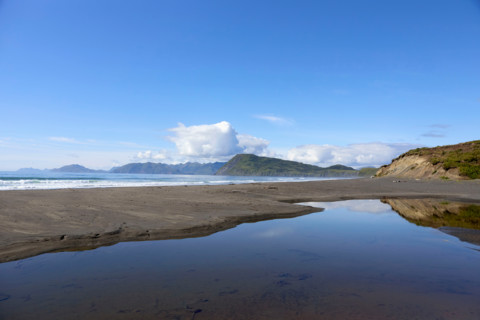 Hills seen from Fossil Beach. Kodiak, Alaska, United States