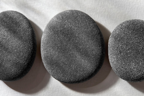 Stones on white textured background. New York City, New York State, United States