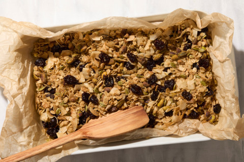 Overhead view of homemade granola on baking sheet. New York City, New York State, United States