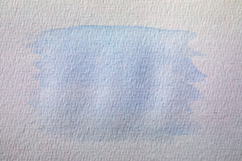 Abstract light blue watercolor on paper. New York City, New York State, United States