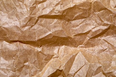 Close-up of wrinkled brown paper. New York City, New York State, United States