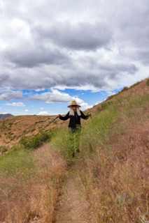 Woman on hiking trail near Carbonate Mountain. Hailey, Idaho, United States
