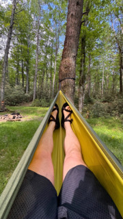 Legs of woman relaxing in hammock. Blacksburg, Virginia, United States