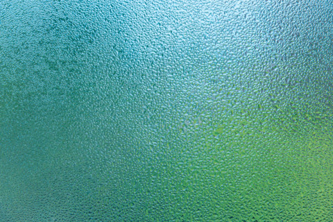 Condensation patterns on glass with green tones. Leura, New South Wales, Australia