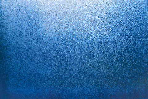 Condensation patterns on glass with cool tones. Leura, New South Wales, Australia