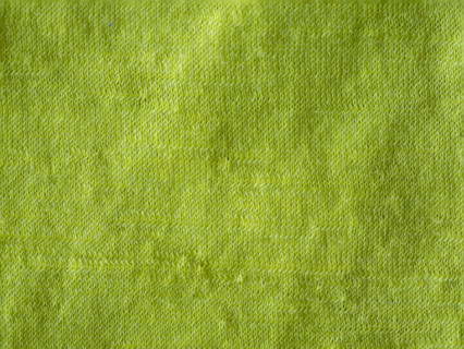 Textured detail of lime green merino wool textile. Leura, New South Wales, Australia