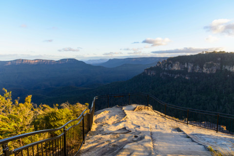 Golden sunset view of Three Sisters and Jamison Valley. Leura, New South Wales, Australia