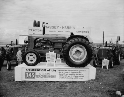 745 diesel tractor engine. A Massey-Harris 745 diesel tractor engine on display on the