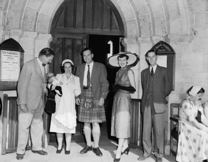 Nairobi christening. Family group gathered outside the entrance to All Saint's Church for the