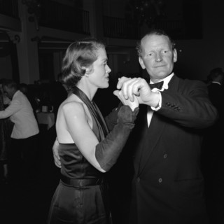 Motor sports dance. A formally dressed couple dancing at the motor sports dance and prize