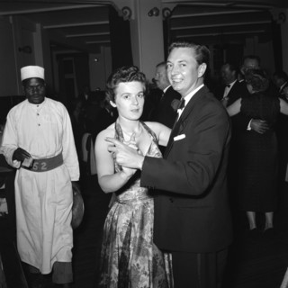 Motor sports dance. A formally dressed couple dancing at the motor sports dance and prize