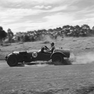 Flying A. An Austin 'Flying A' racing car driven by Prinsloo competes in race number eight at the