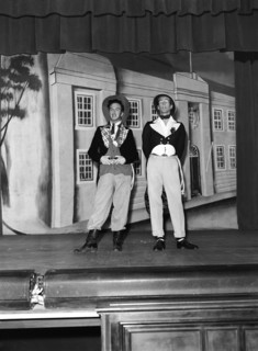 What a bore'. Wearing theatrical costume, Fred and Watson perform their 'What a bore' act on stage