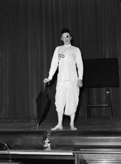 Five minute Alibhai'. Wearing theatrical costume, Peter Colmore performs his 'Five minute Alibhai'