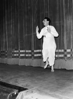 Five minute Alibhai'. Wearing theatrical costume, Peter Colmore performs his 'Five minute Alibhai'