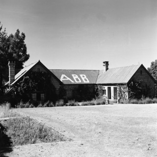 Gabb's house. A single storey house with tall chimneys displays the large painted letters 'GABB',