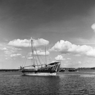 Dhows in a harbour. Dhows in a harbour off the coast of Zanzibar (now Tanzania) in the Indian ocean