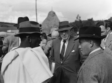 Littleton and Chief Makimei. A Western official identified as 'Littleton' talks to Chief Makemei in