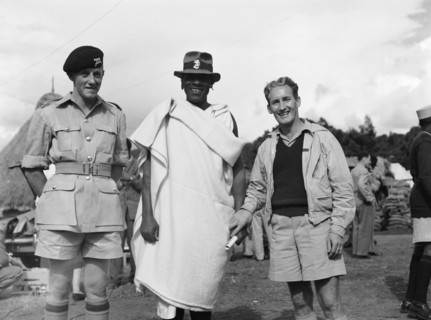 Chief Makimei with KPR officers. Chief Makimei with two Kenya Police Reserve (KPR) officers.