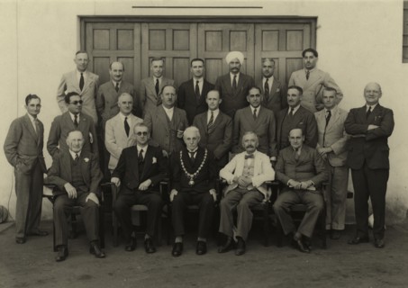 Members of Mombasa Town Council. Group portrait of 21 members of the Mombasa Town Council. The men