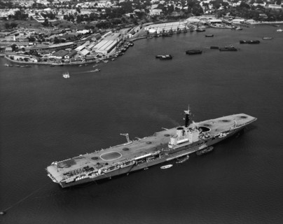 HMS Bulwark in Kilindini harbour. An aerial publicity photograph from the East African Railways and