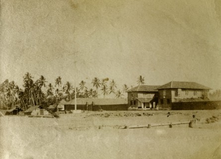 Custom House, India. A Kerala Custom House surrounded by palm trees on the beach. Calicut, India,