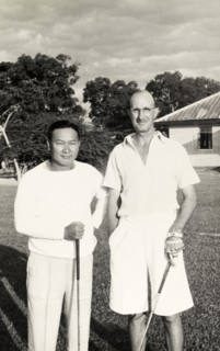 Golf partners, Rangoon. R.B. Groves, a Captain of the Rangoon Golf Club, poses for a portrait