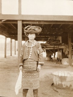 Kachin woman in traditional dress. Portrait of a Kachin woman dressed in traditional costume. She